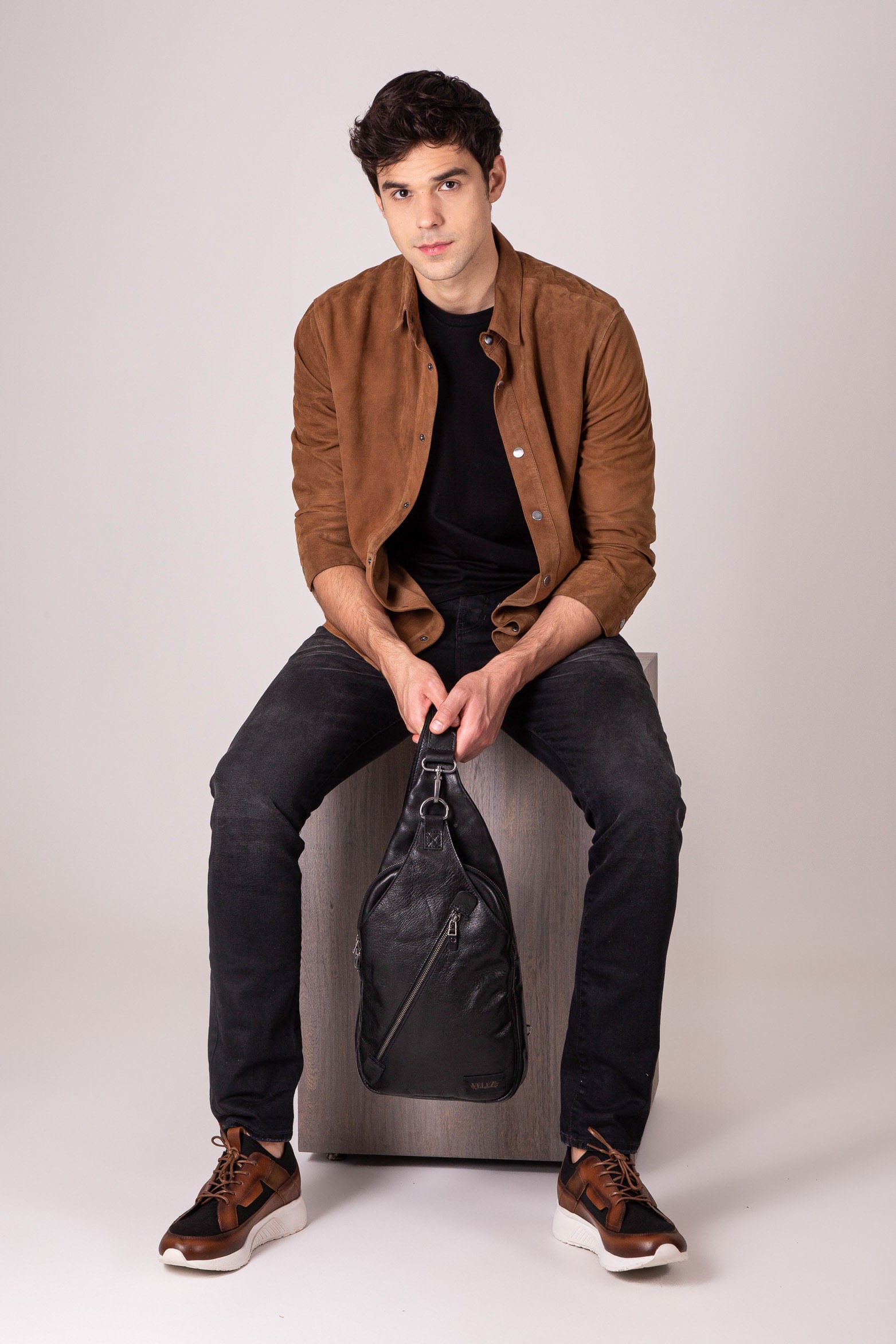 Men’s Sling Handbags in Black Leather with Adjustable Strap