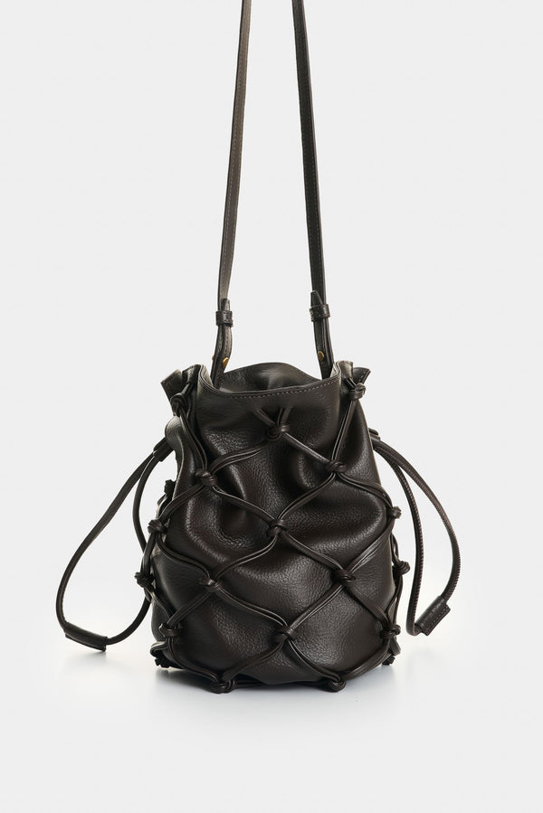 Adjustable leather strap with buckle holes