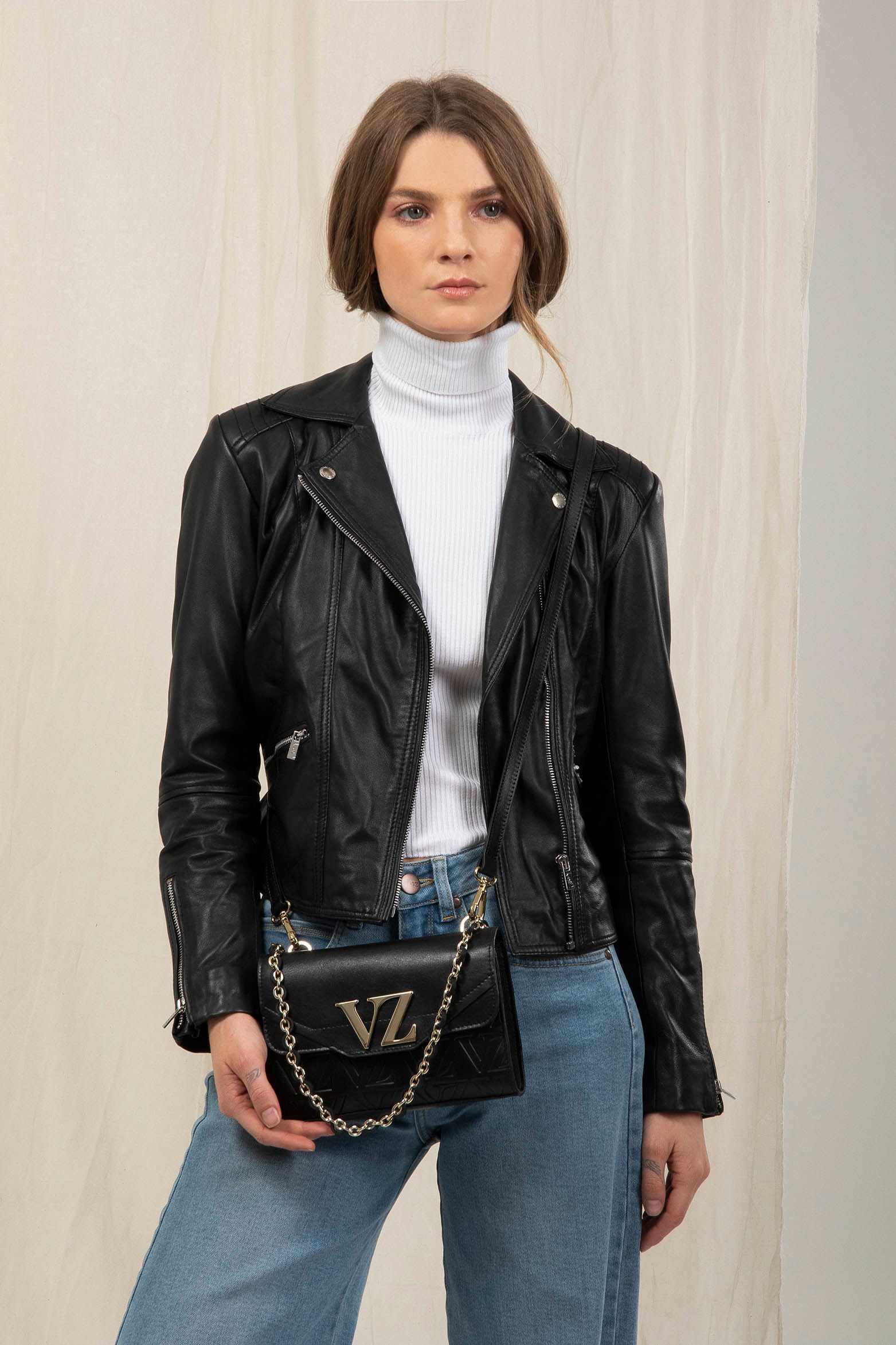 Lili Mini Shoulder Handbags in Embossed Black Leather